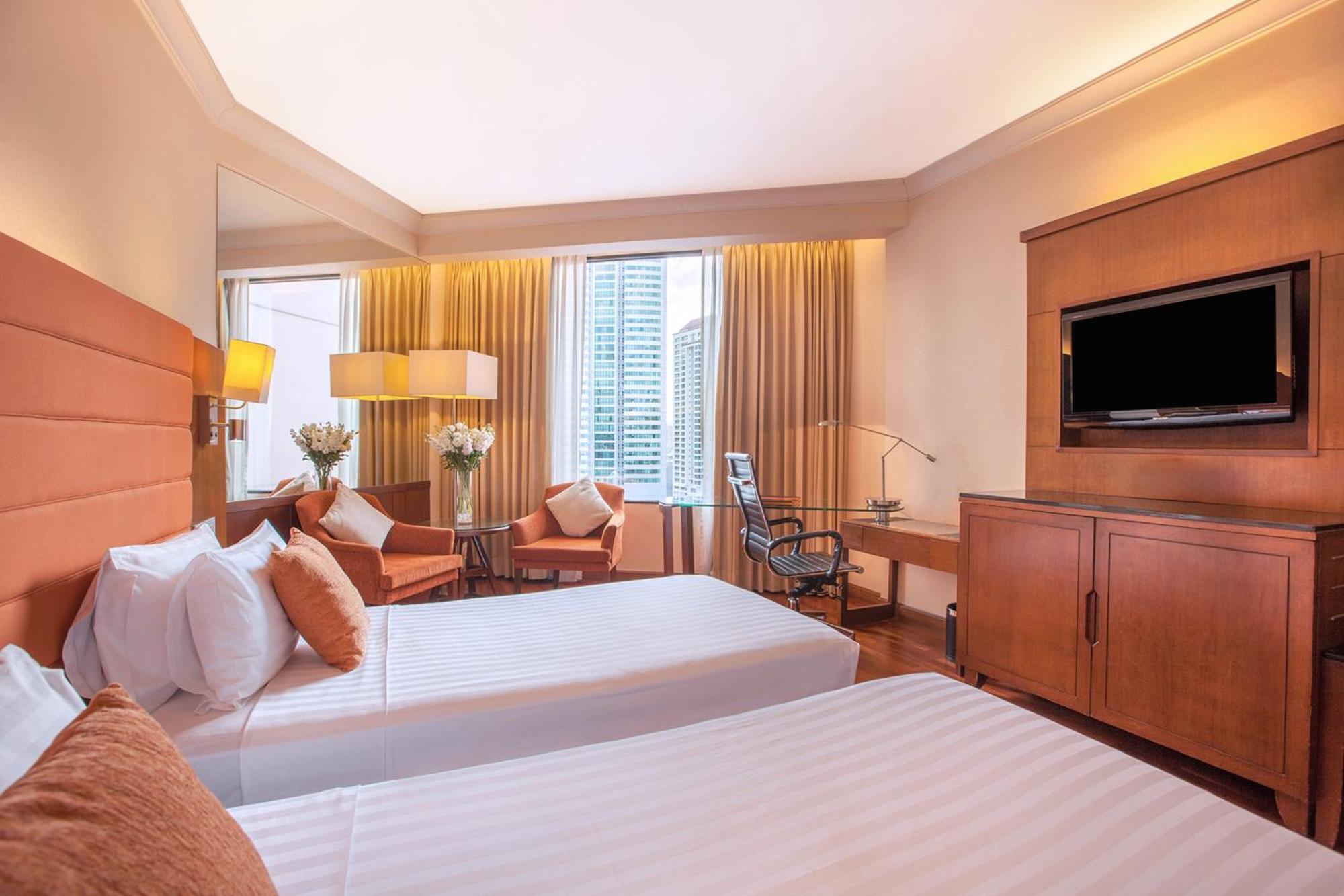 Rembrandt Hotel Бангкок Номер фото